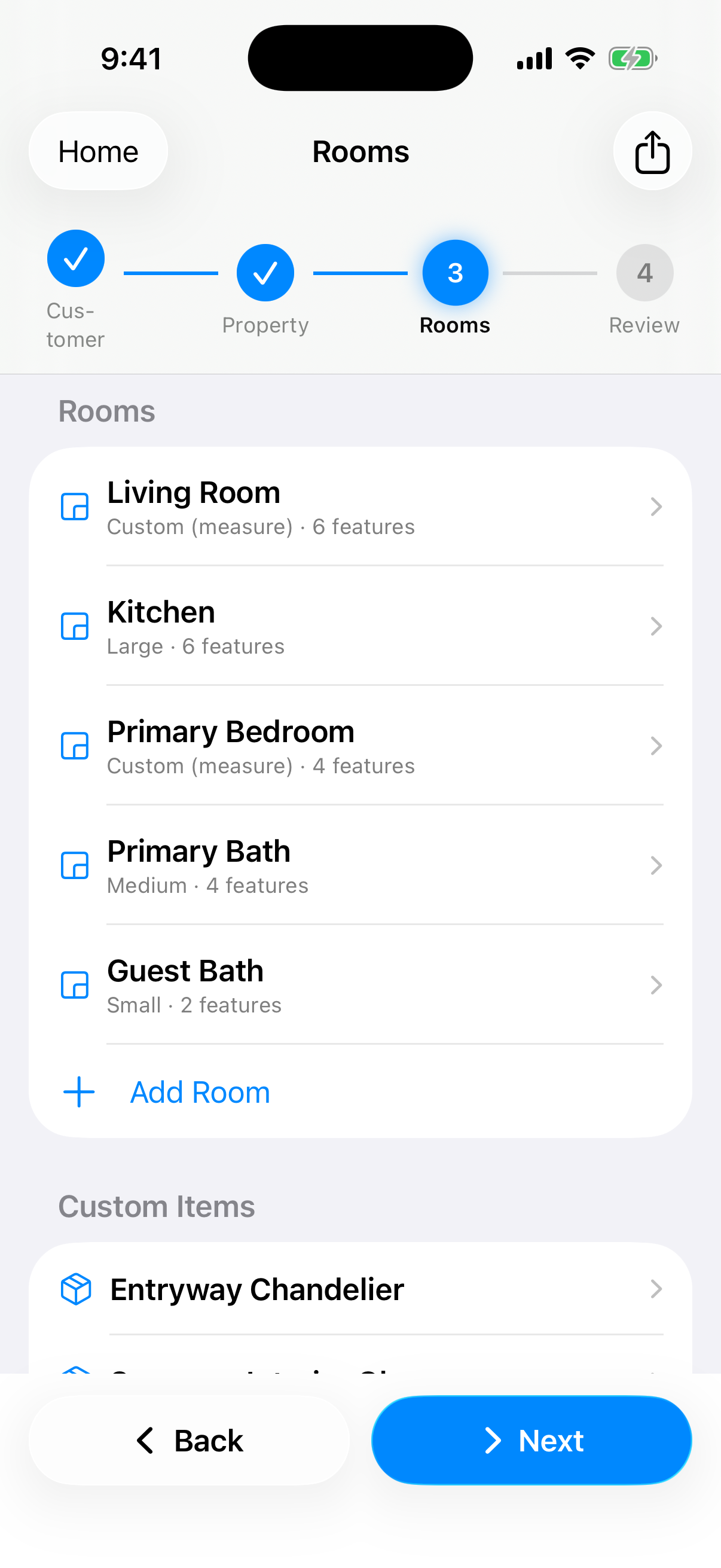 CleanQuotes on iPhone listing the scanned rooms in a property with running square footage